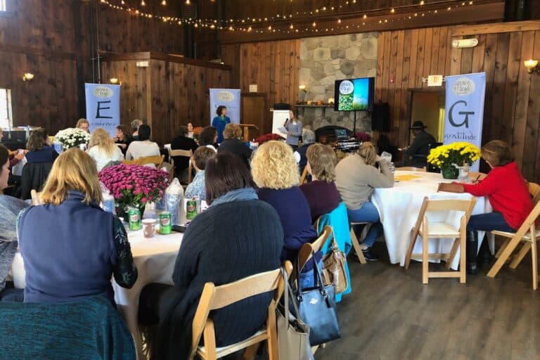 Anne Jolles speaking with community members about Grace Trail and wellness partnerships